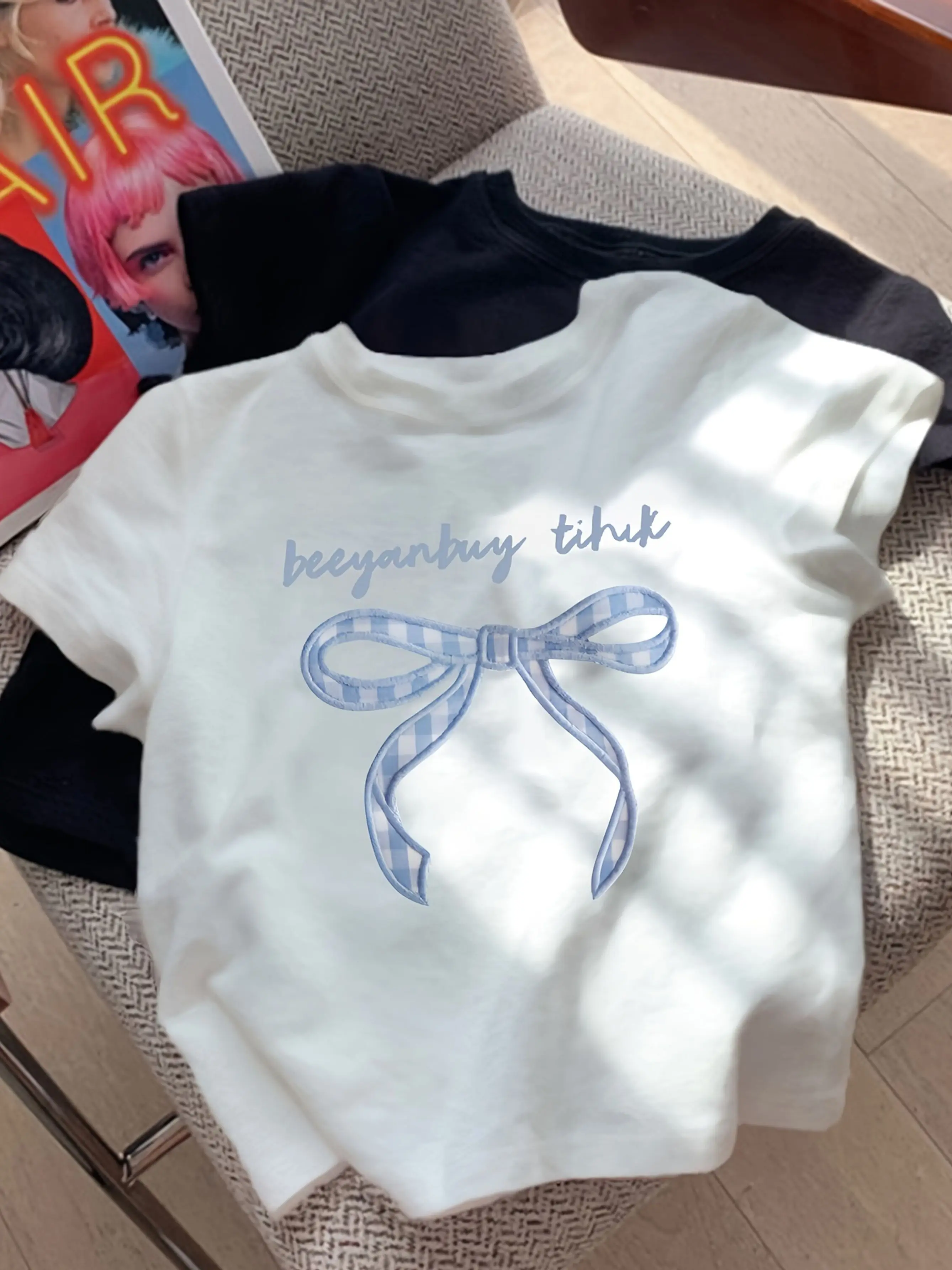 Sleeved T-Shirt Women Featuring A Sweet and Feminine Style Crafted From It Has A Fit Adorned with Blue Plaid A Bow Handwritten