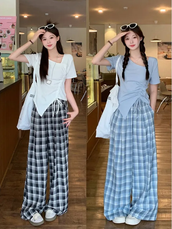 

Летний повседневный комплект больших размеров: асимметричный топ и широкие брюки, скрывающие недостатки фигуры, модный женский костюм из двух предметов