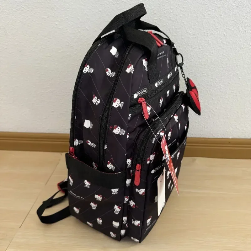 Sanrios Hellokittys Co Branded Black Backpack Anime Kawaii Large Capacity Backpack Simple College Style Commuter Computer Bag