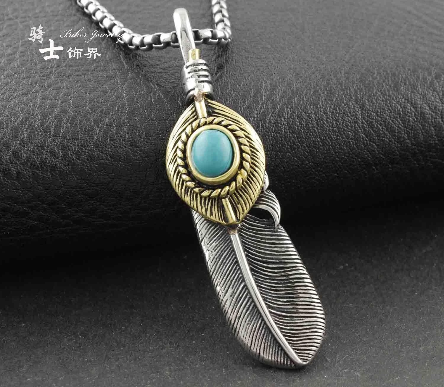 

Titanium steel European and American retro trendy men's personalized locomotive, malachite feather couple pendant necklace