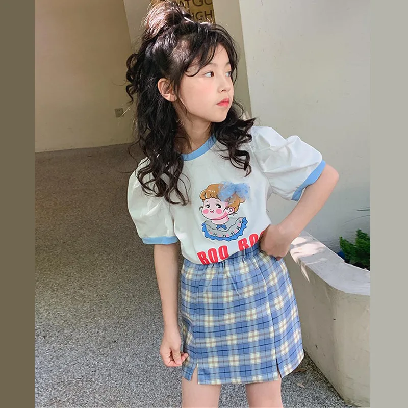 

Girl Summer Clothes 2023 New Puff Sleeve Short-Sleeved T-Shirt and Plaid A-Line Skirt Set Two-Piece Clothing for Girls