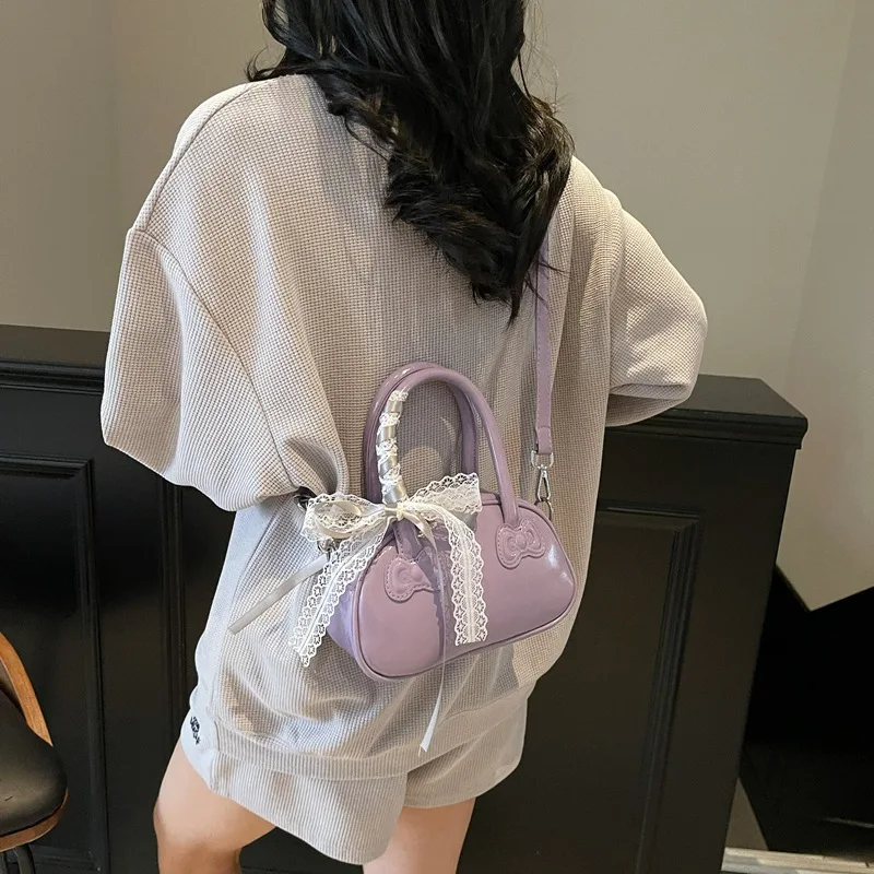 Torba damska wersja koreańska stylowa przenośna torba na poduszkę damska Superior Sense prosta koronkowa słodka torba na ramię typu crossbody urocza torba z kokardką