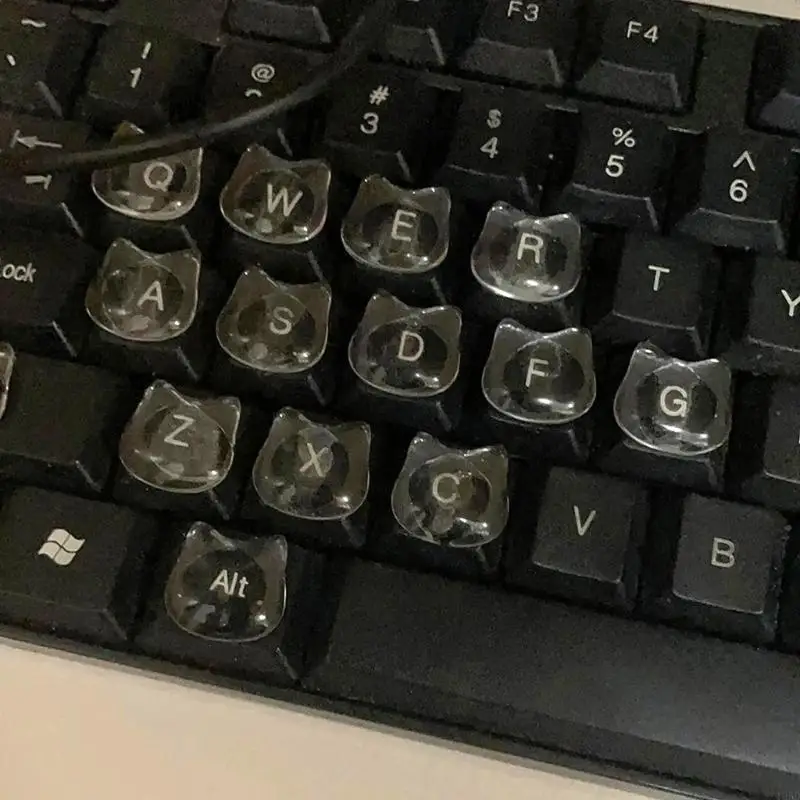 

Набор из 20 силиконовых накладок на клавиатуру в виде милых кошачьих головок: улучшают комфорт набора текста, подходят для акриловых ногтей и стильных ПК-аксессуаров