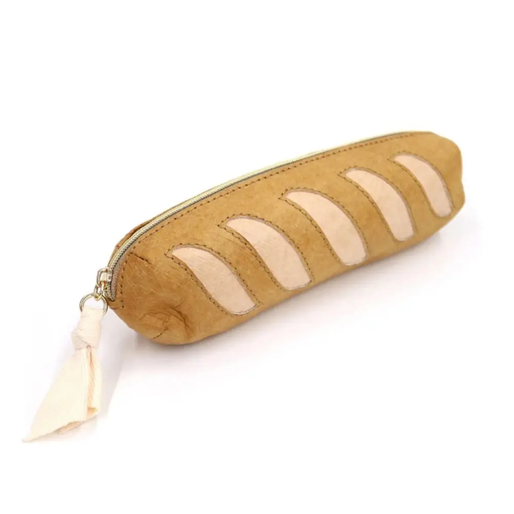 Piórnik w kształcie francuskiego baguette, duża pojemność, zapinany na zamek, papier Dupont, etui na markery, kreatywny.