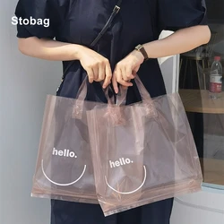 StoBag 50pcs Transparent Plastic Woman's Shopping Tote Bags Smile Clothing Packaging Big Portable Reusable Store Logo Wholesale