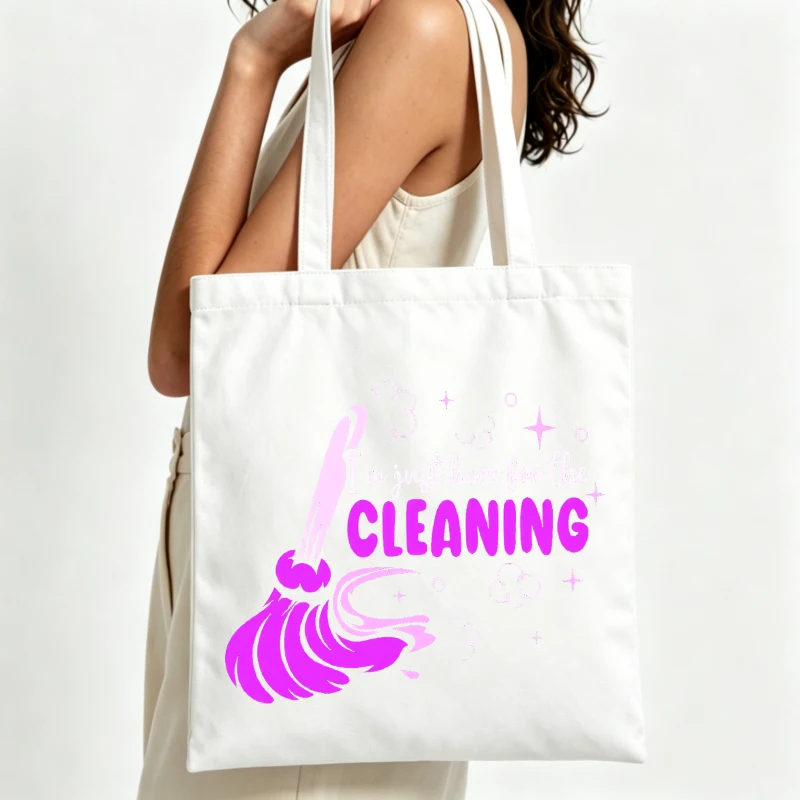 cleaning-themed canvas tote bag with broom graphic and slogan print, perfect for daily use and casual outings