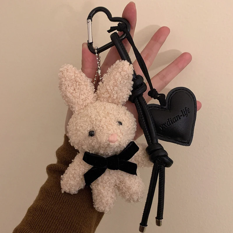 Portachiavi con coniglietto di peluche Kawaii Ciondolo a forma di cuore in pelle Borsa per bambola di cartone animato Portachiavi per auto Accessori per ciondolo borsa per coppie