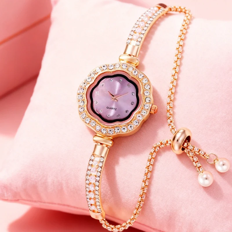 A women's rose-pink minimalist elegant floral dial starry pull-chain quartz watch