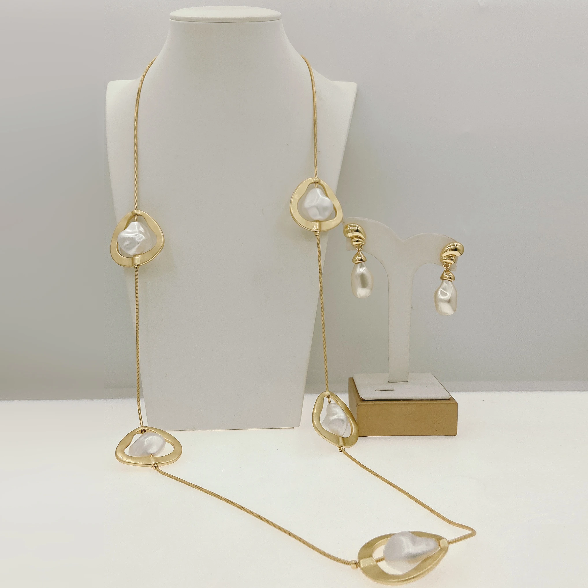 

The latest irregular artificial pearls long chain pedant Jewelry set Collar Brazalete Aretes Anillo 2pc jewels for party gift