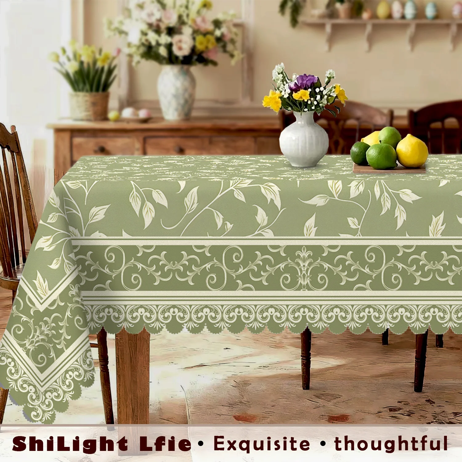 Nordic-style tablecloth, with a light green background, decorated with white branches and leaves.