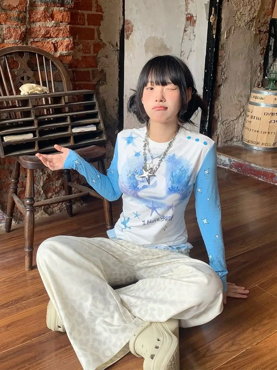 Y2K-pantalones con estampado de leopardo para mujer, pantalón holgado de pierna recta, diseño adelgazante con falda superpuesta, pantalones de moda en capas