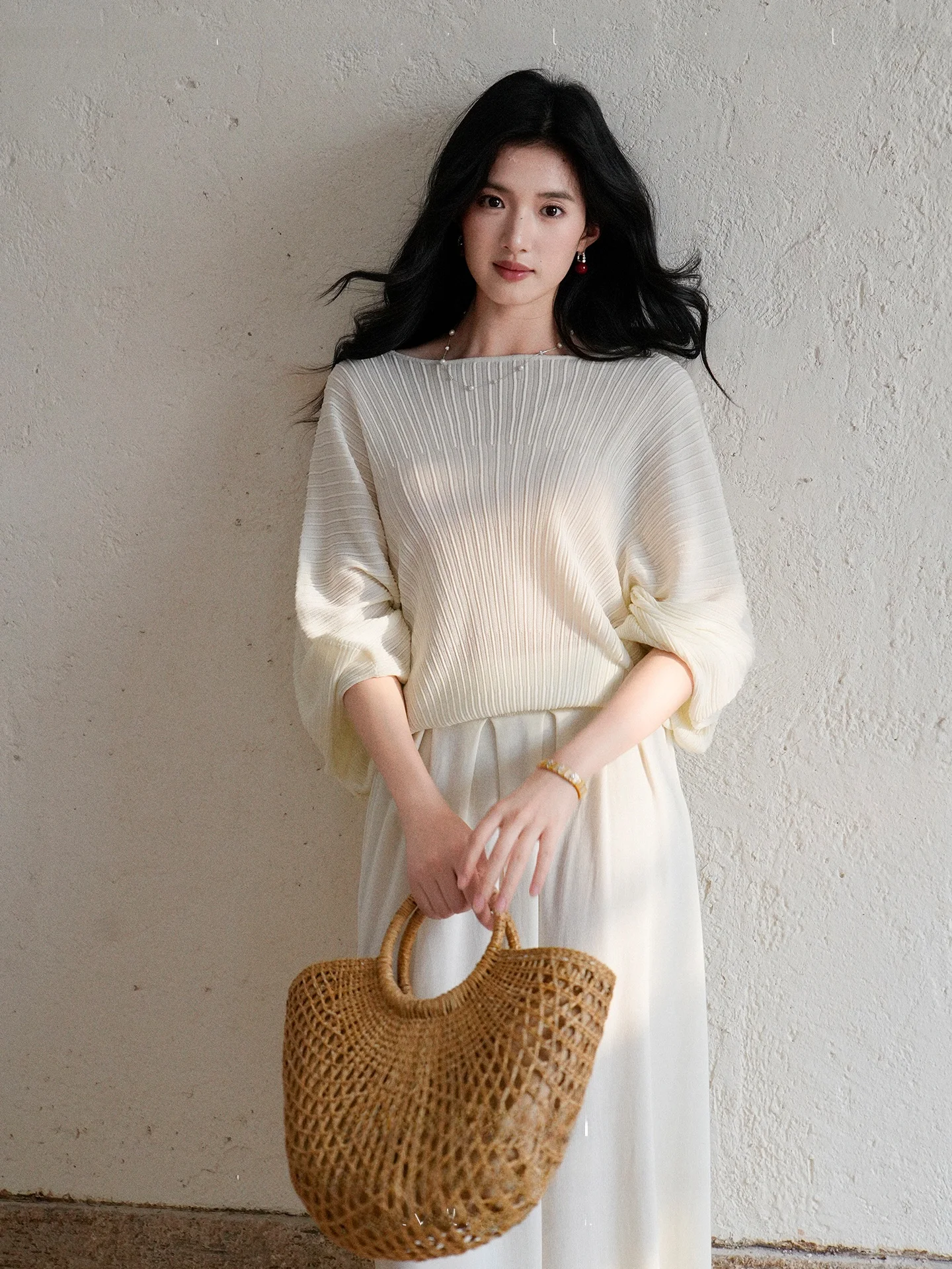 

Elegant Ruched Knitted Two-Piece Set with Sleeveless Base Layer Top And Half-length Skirt Vertical Pit Pattern Fashiona...