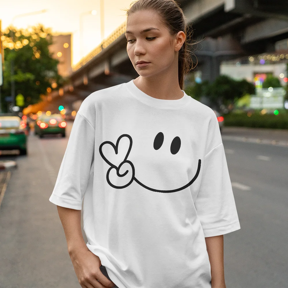 

The Fashionable T-shirt, Featuring A Cute Smile and A Peace Sign Design, Is Ideal for Curvy Ladies Seeking Playful Fashion