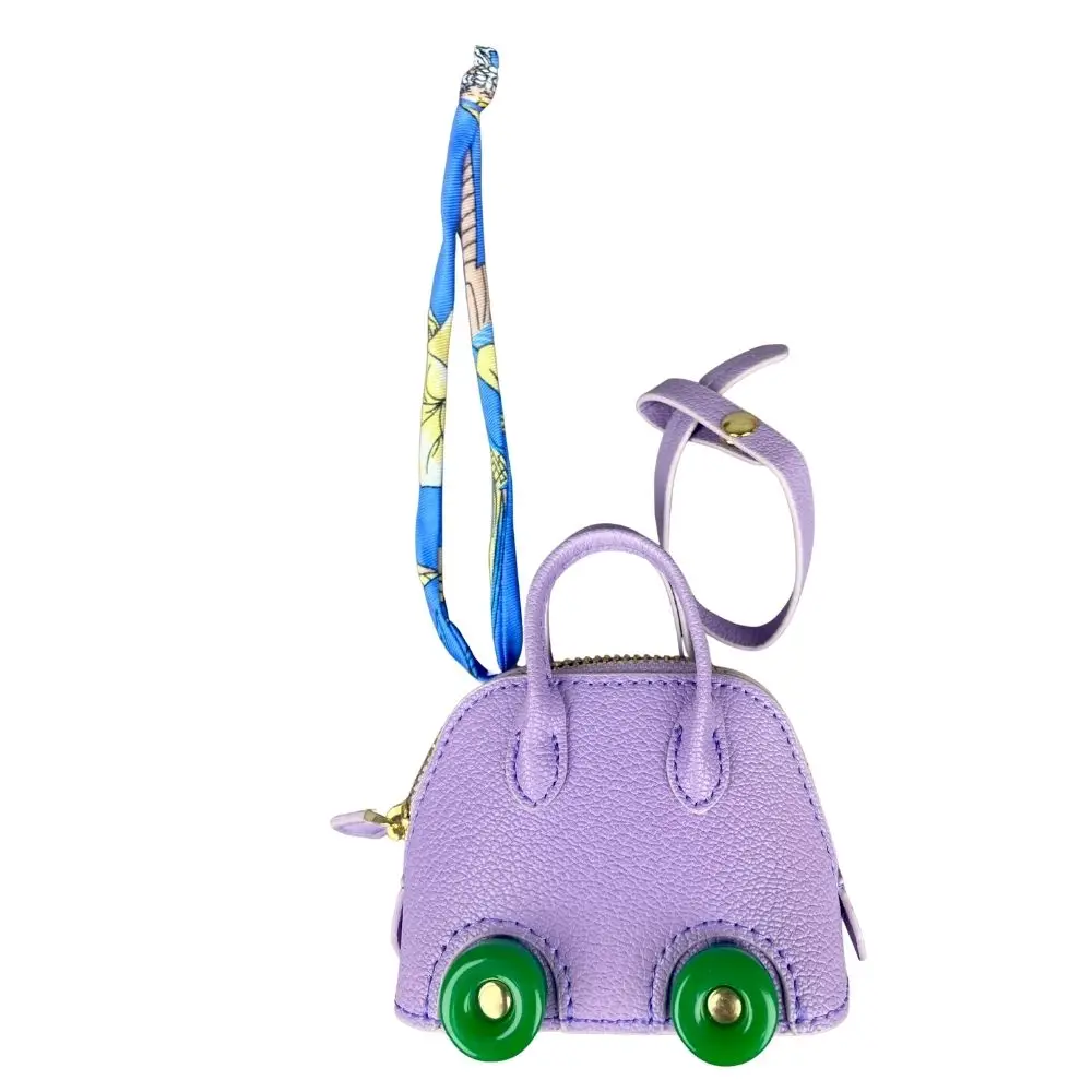 Mini-Taschenanhänger aus Leder mit niedlichen Rädern – Kopfhörer- und Lippenstiftbeutel mit zwei Riemen – PU-Leder – ideal für Taschenzubehör – Detail 10
