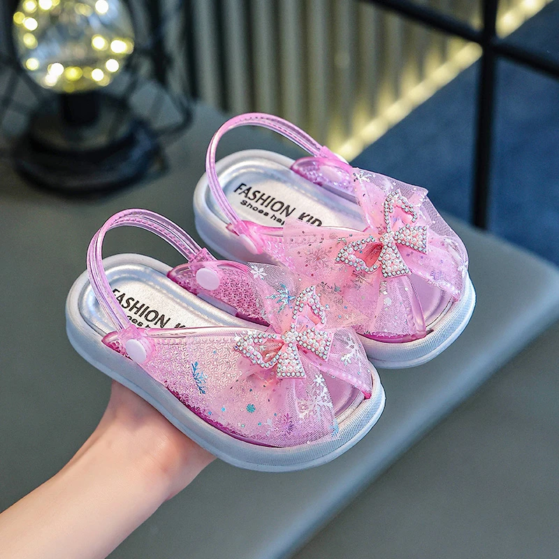 

Girls Summer Sandals Mesh Lace Soft Breathable Princess Kids Beach Slippers Sweet Pearls Fish Mouth 2026 Summer Butterfly Bow