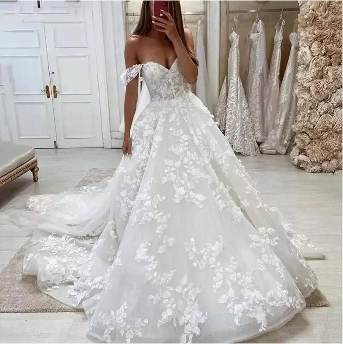 فساتين زفاف فاخرة مزينة بالدانتيل على الكتف وأكمام قصيرة بوهو حبيب الزفاف Gowns2023