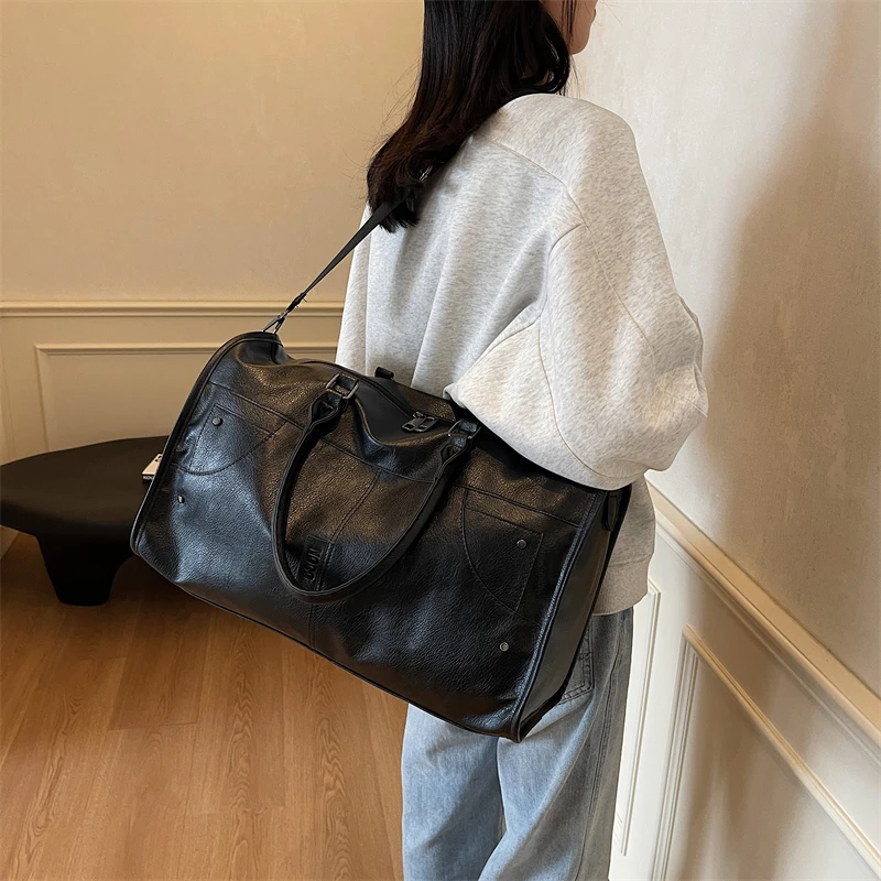 موضة بولي PU حقائب السفر سعة كبيرة جودة عالية الصلبة شعبية الخياطة الموضوع النمط الكلاسيكي حقيبة سفر للنساء 2026 جديد #1