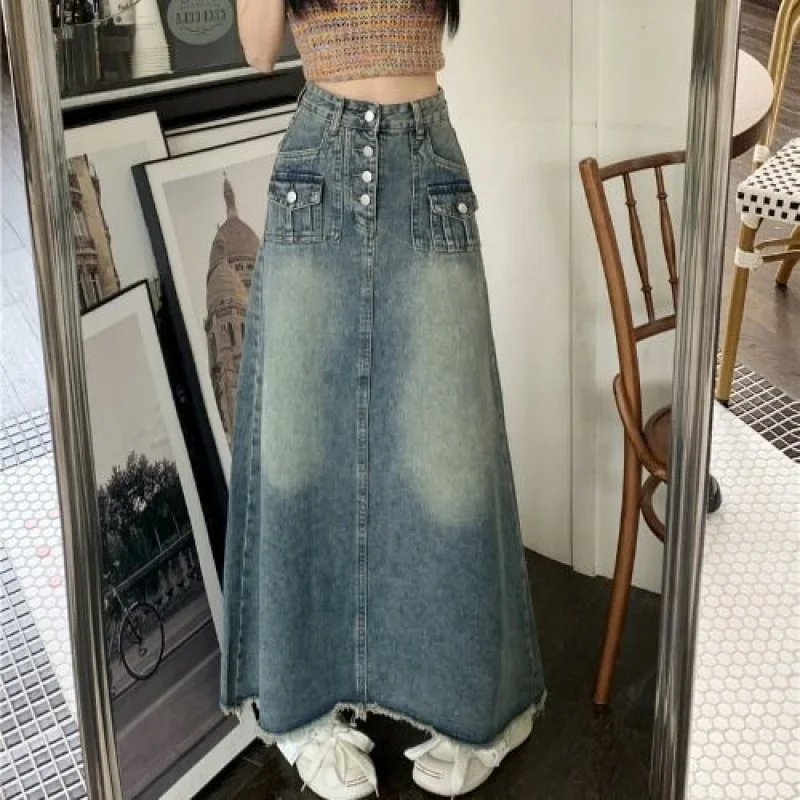 

Tassel fringed denim skirt with a high-end feel for women2025New high-waisted mid-length skirt that conceals the hips and makes