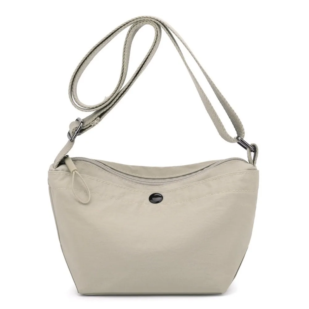 

Solid Color Nylon Messenger Bag Korean Style Large Capacity Canvas Crossbody Bag Light Weight Dumpling Shape Single Shoulder Bag