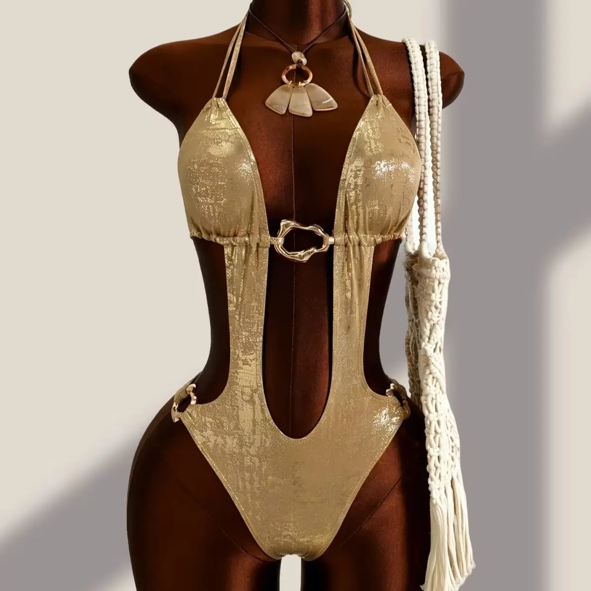 DEKA Gold Hollow Out Backless One Piece Swimsuit Sexy Brozing Print Swimwear Thong Women Summer Metal Chain Bandage Holiday
