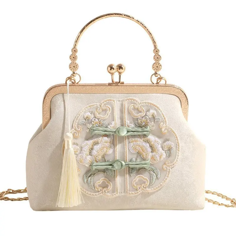 

Wearing a cheongsam bag with 2024 new style Chinese embroidery plate buckle handbag paired with a horse face skirt bag