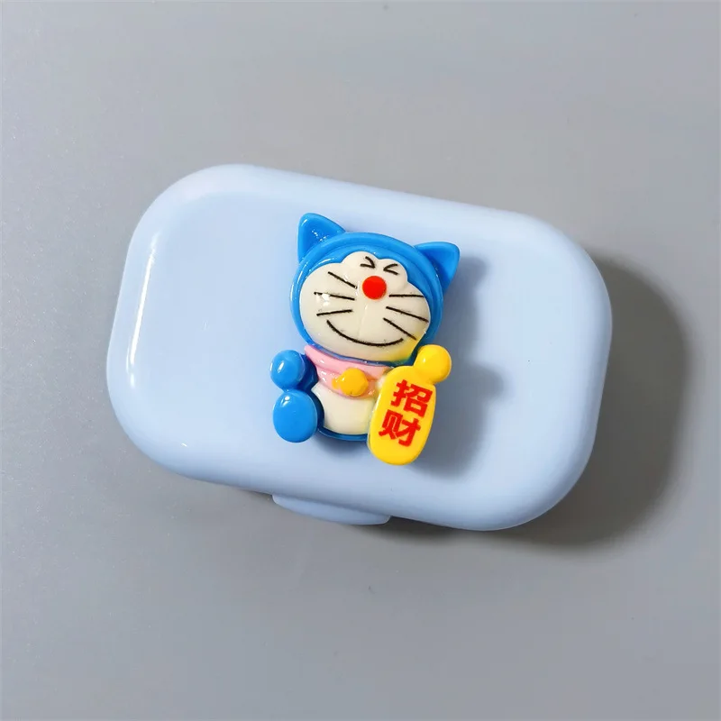 Doraemon Robot Cat Contact Lens, banc de boîte d'acceptation, dessin animé, bref, portable, compact, chanceux, richesse, article mignon, nouveau, 2024