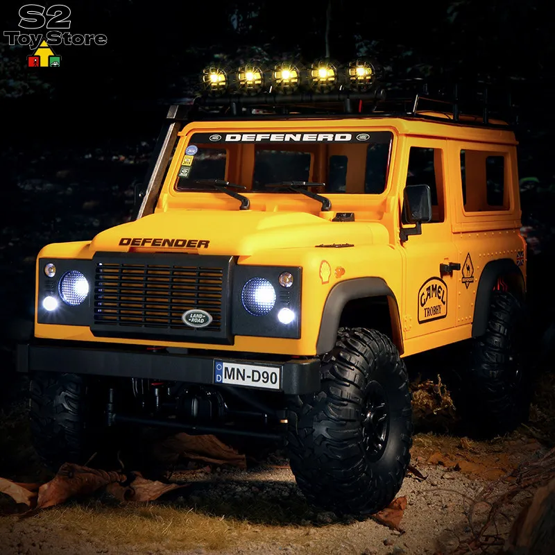 1:10 Scale MN98 Camel Trophy Defender 90 RC Crawler with Licensed Body and 4 Wheel Drive Off Road Vehicle Model Gift