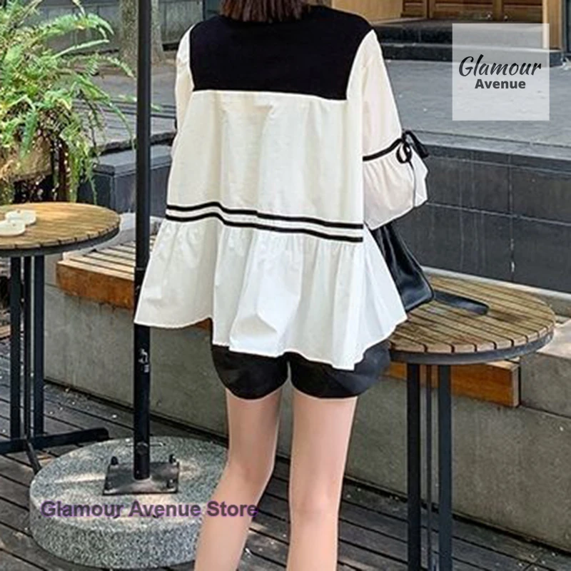 Camisa de manga larga con cordones a rayas blancas y negras de estilo coreano para mujer primavera y otoño nueva moda temperamento costura top