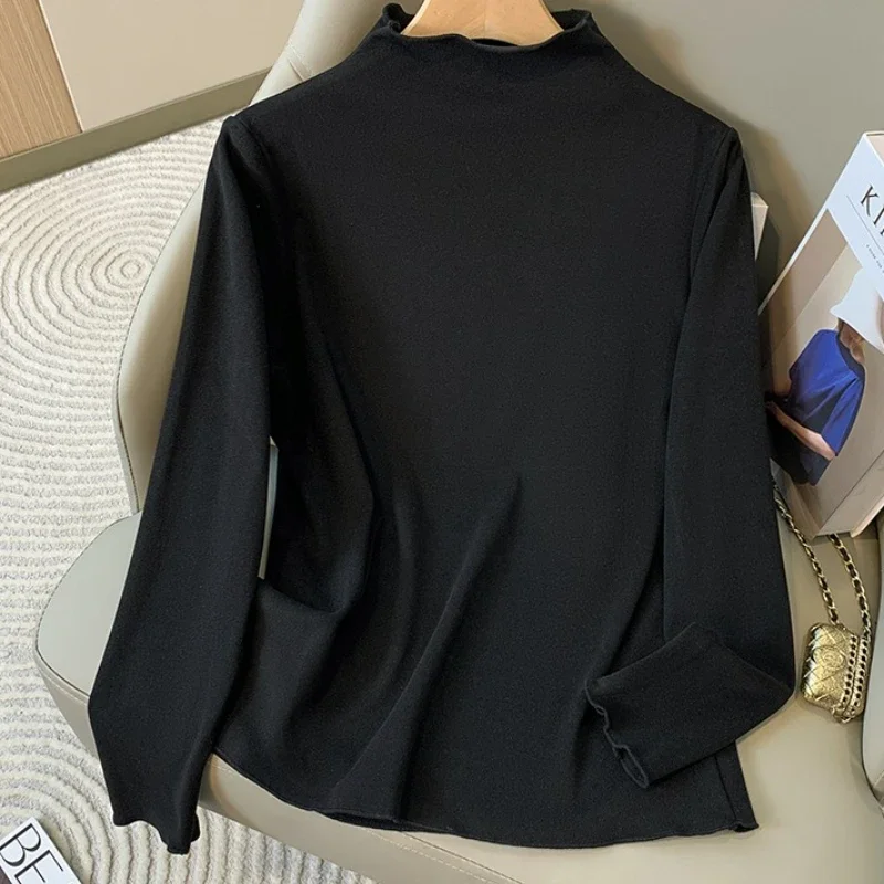 ملابس داخلية للخريف والشتاء مبطنة بالصوف موضة قطع علوية كبيرة الحجم 2025 مقاس كبير تي شيرت نسائي بأكمام طويلة وياقة مدورة مخملية