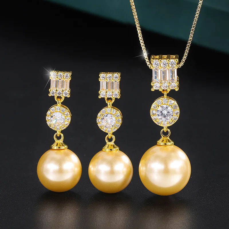 

Inlaid with light yellow mother-of-pearl, Korean-style fashion diamond pendant14mmEar Studs12mmWholesale of sets