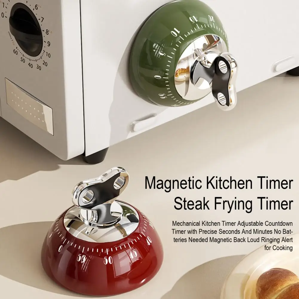 A vintage mechanical kitchen timer with a magnetic base, a cute and retro magnetic alarm clock suitable for use in the kitchen