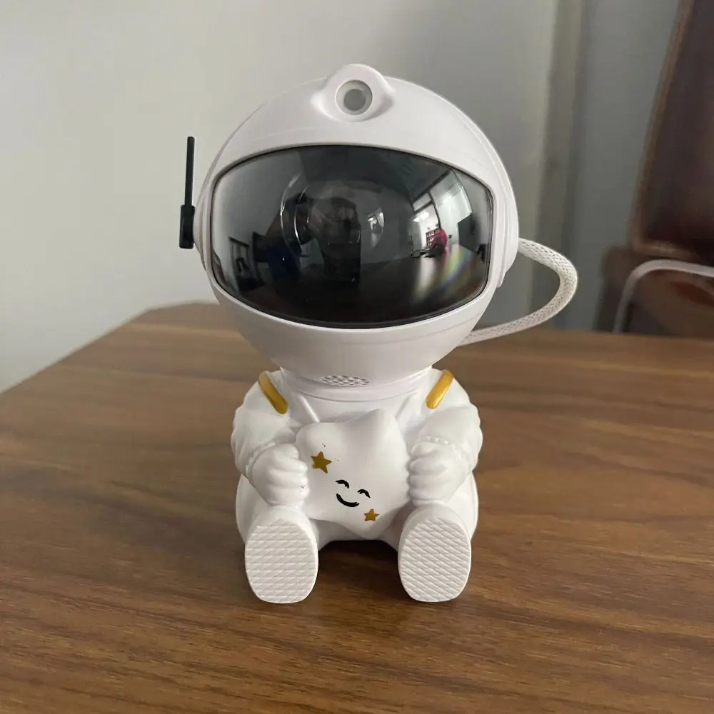 Mini projecteur d'astronaute télécommandé Projection étoilée Source de lumière LED projecteur d'étoiles montage au plafond nébuleuse lumière thème spatial