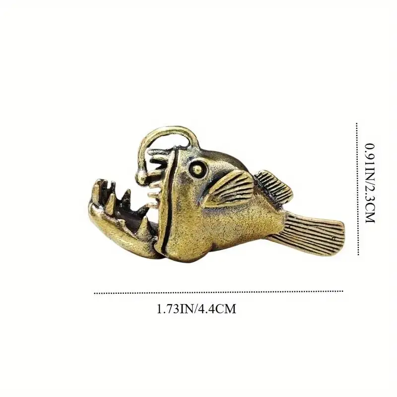 A vintage bronze fishing fish sculpture, a unique tea pet artwork, suitable for aquatic enthusiasts and home décor.