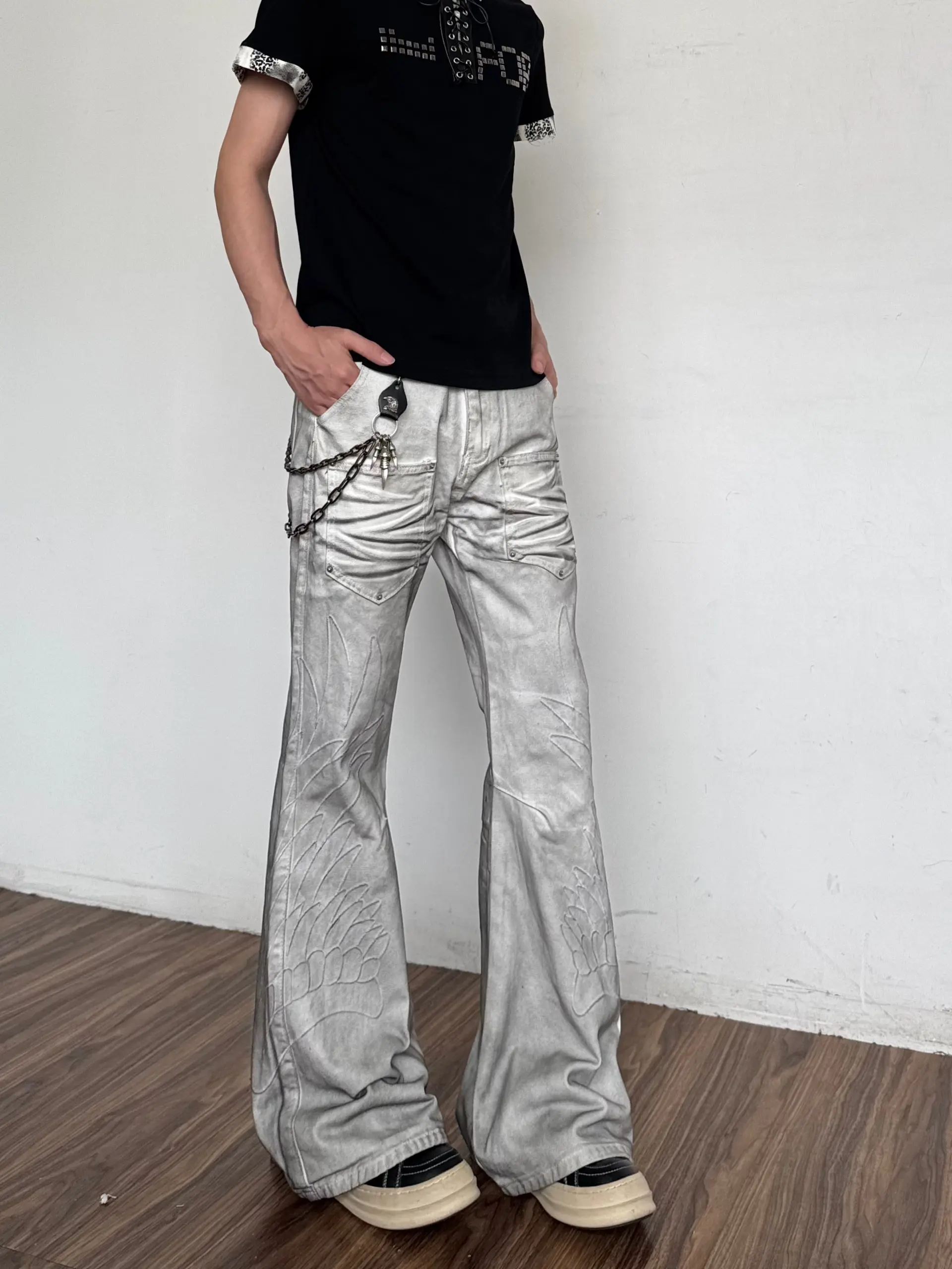 Retro American High Street Wing Embroidery Stained Micro Flared Jeans Men Women Straight Leg Pants Non Shrink Loose Fit Jeans