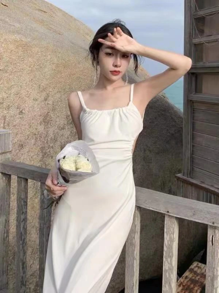 Design sense halter white slip dress women 2024 summer new fashion everything temperament wrapped hip strap dress