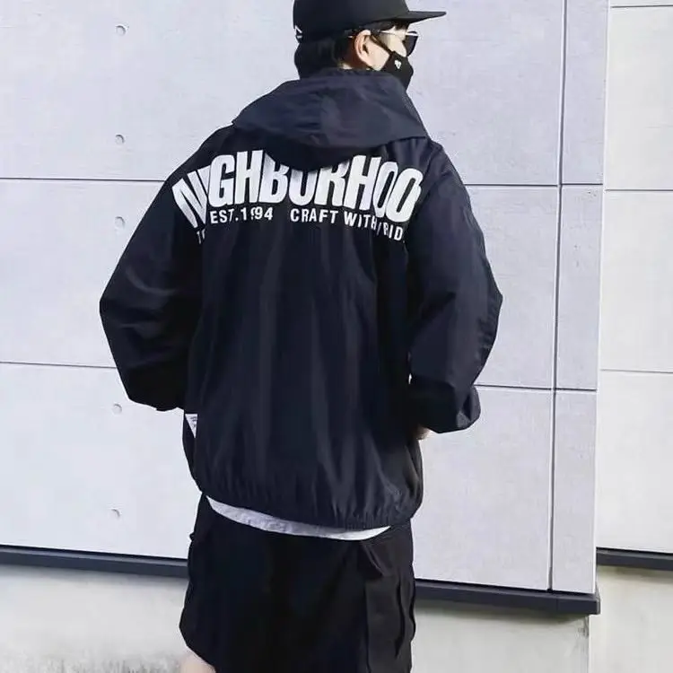 NEIGHBORHOOD Outdoor Windbreaker Jacket, Functional Nylon Hooded Coat, Weather-Resistant Shell