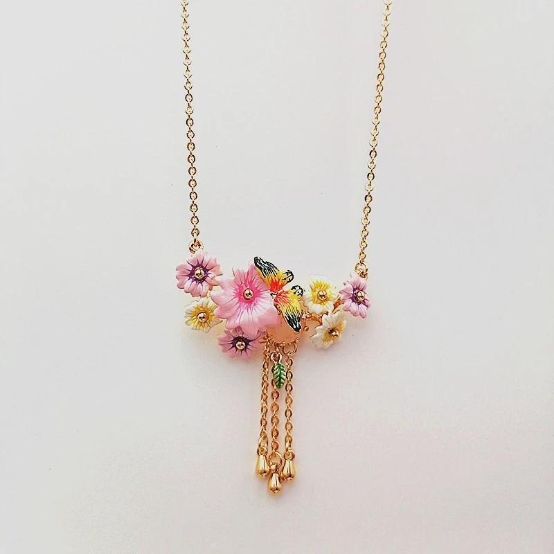 

Colorful Parrot Flower Necklace for Women Enamel Bird Pendant with Pink Floral Details Whimsical Jewelry Gift Idea