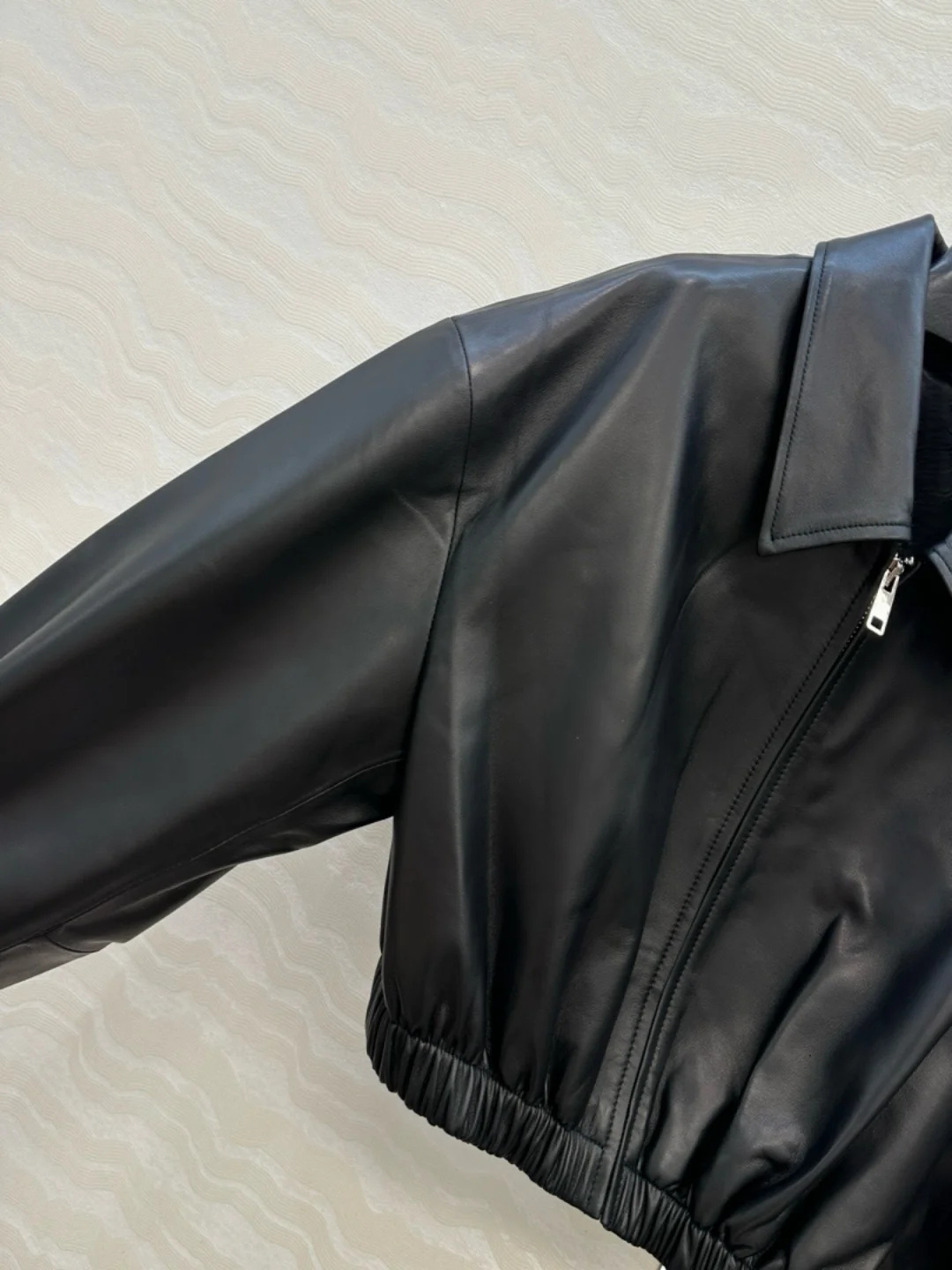 Giacca da donna in pelle di agnello alla moda con risvolto corto elastico in vita slim fit con cerniera in metallo capispalla casual caldo invernale