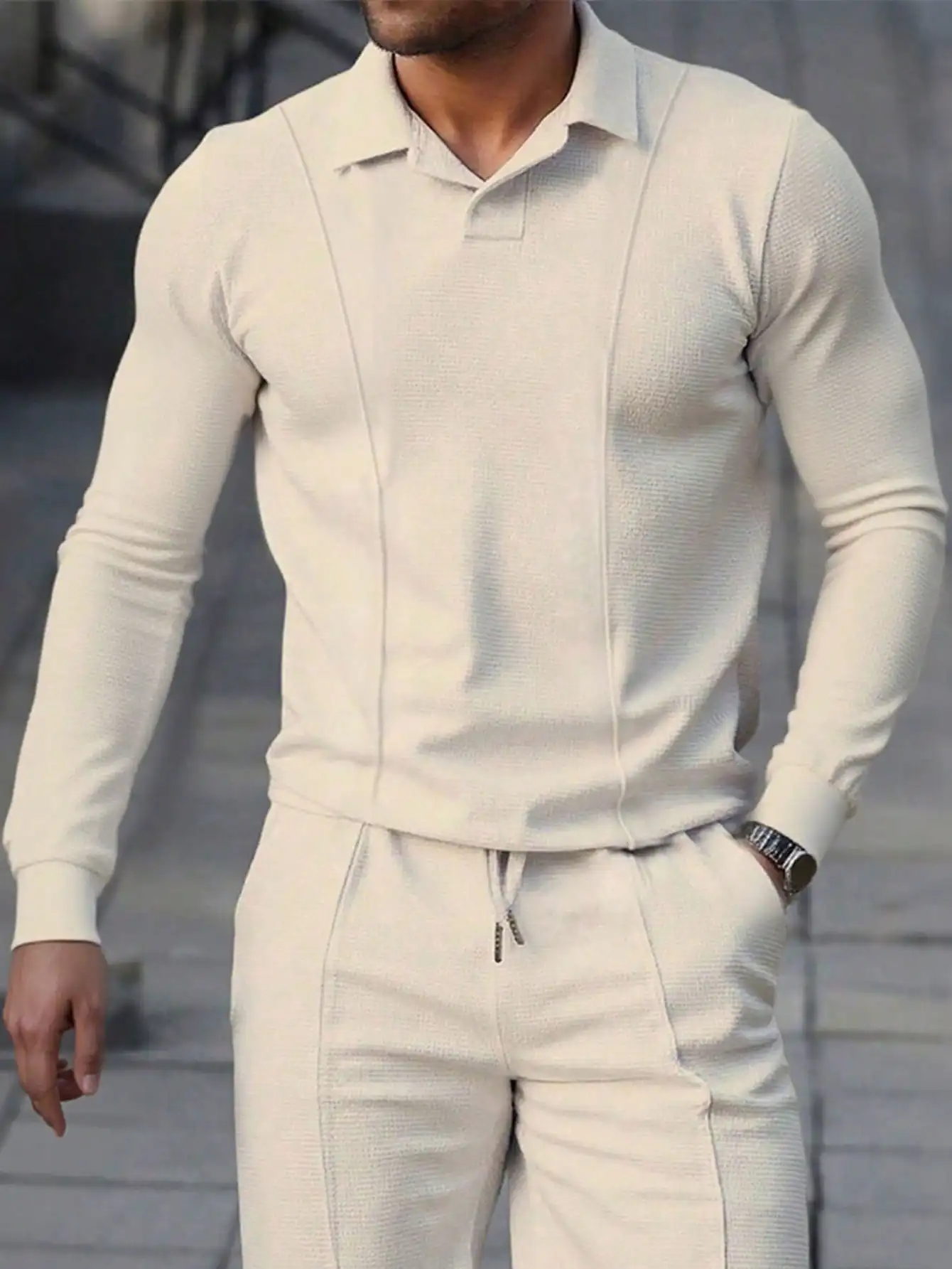 

Men's Solid Color Long Sleeve Knit Polo Shirt with Textured Panel Design
