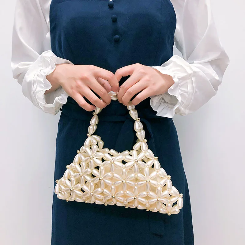 

New Fashion Pure Handmade Bridal Weaving Hand Bag Imitation Pearl Trend Flower Hollow Out Banquet Bag Women's Wedding Handbag