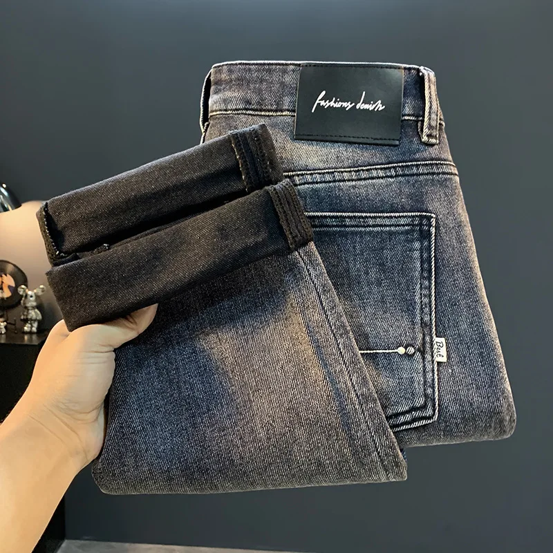 2025 خريف جديد الراقية الدخان الرمادي الجينز الرجال العلامة التجارية العصرية مرونة فضفاضة تظهر رقيقة مستقيم أنبوب السراويل الطويلة
