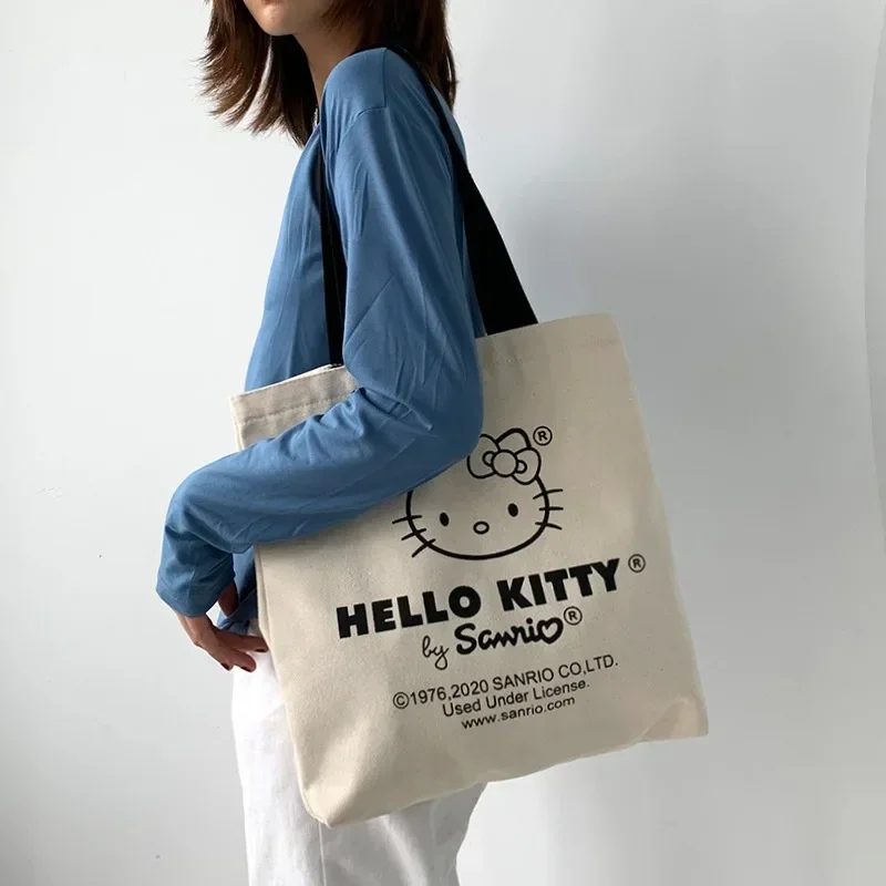 

Sanrio Hello Kitty Canvas Tote Bag Femme Shopping Shoulder Bags Cute Travel Tote Luxury Designer Handbags Bolsas Para Mujeres