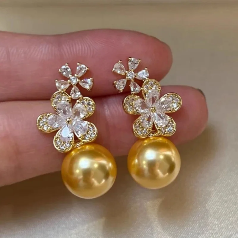 

New pair of natural AAAA oversized 10-11 mm South Sea round gold pearl earrings 925s