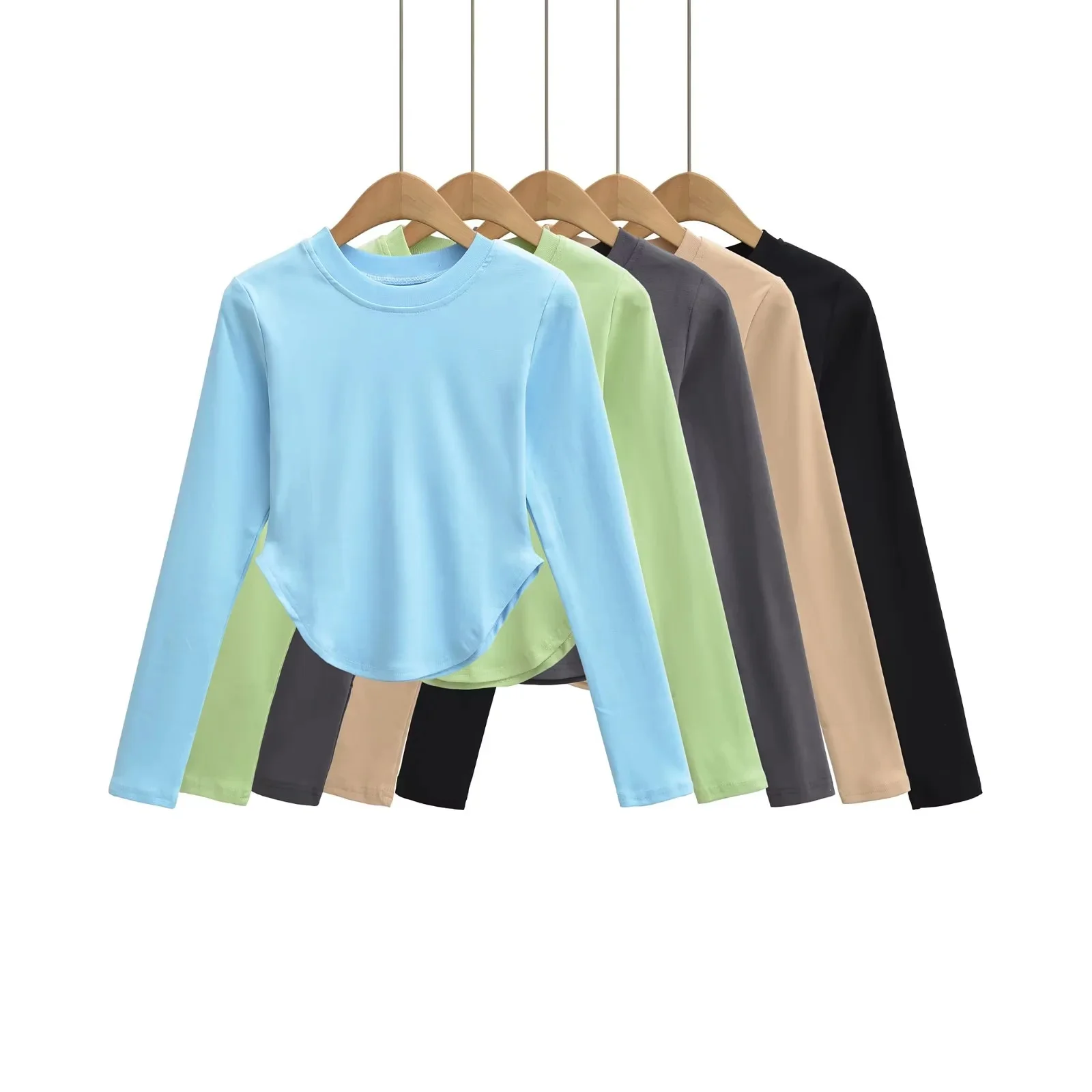 Camiseta de cintura alta de manga larga con cuello redondo y diseño de arco en el bajo, top de moda de primavera para mujer que deja ver el vientre.