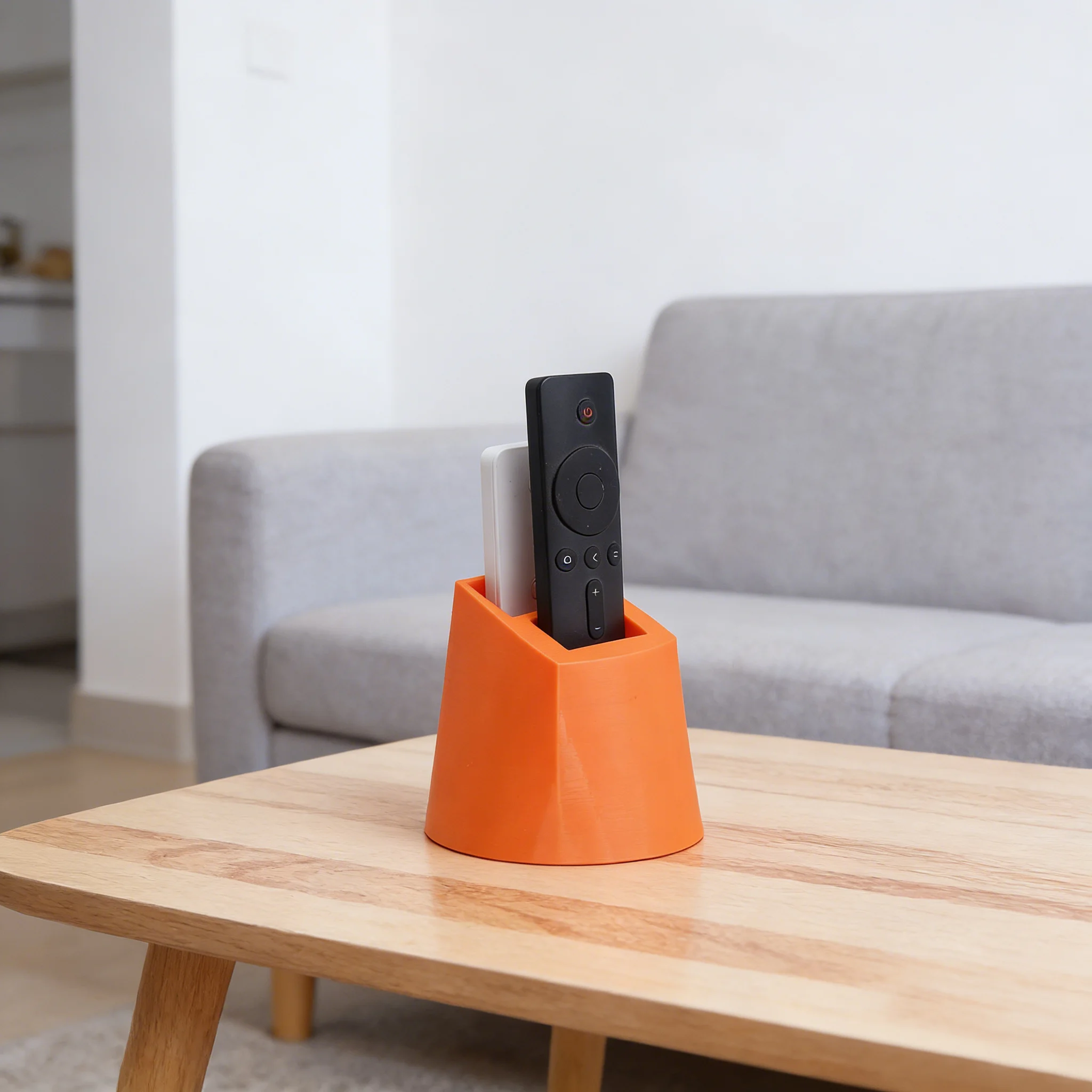 Dual-Port Remote Control Organizer: A practical desktop storage holder that accommodates two remotes. Featuring a minimalist col