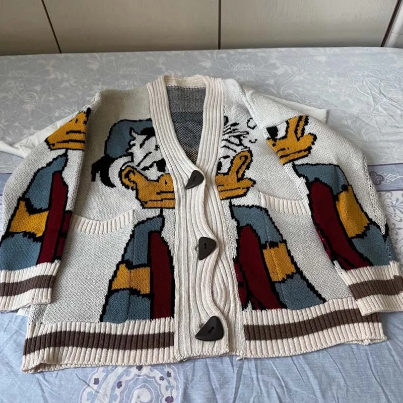 Donald Duck pull Disney Anime dessin animé femmes manteau automne/hiver Cardigan ample tricoté pull haut décontracté fille vêtements cadeau