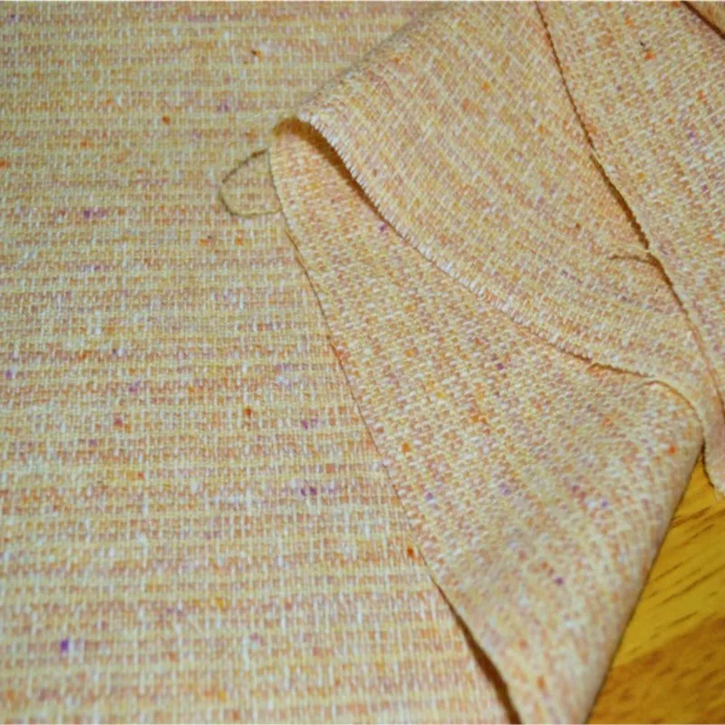 

Gentle and light yellow polka dot dyed woolen fabric for fashion suits skirts spring autumn clothing