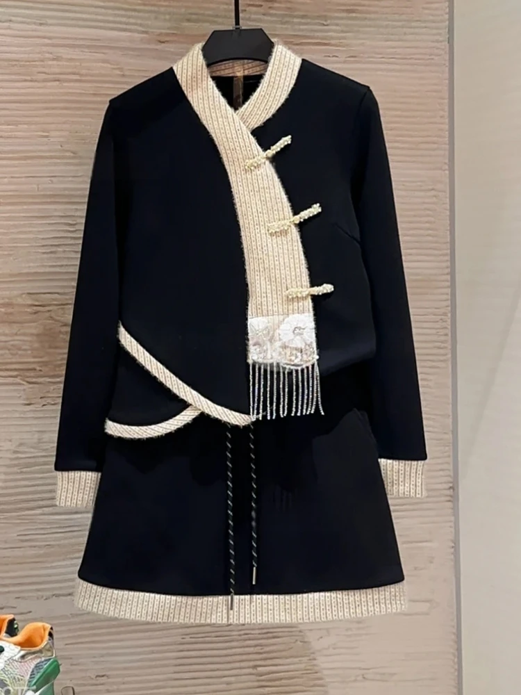 

Уникальный зимний модный комплект 2025: Новое шерстяное пальто в китайском стиле с бахромой и короткая юбка, утепленный костюм-двойка с длинными рукавами и круглым вырезом