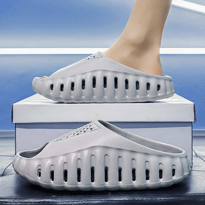 

Summer new one-word drag men's non-slip soft-soled thick-soled outer slippers fashionable thick-soled heightening outdoor shoes