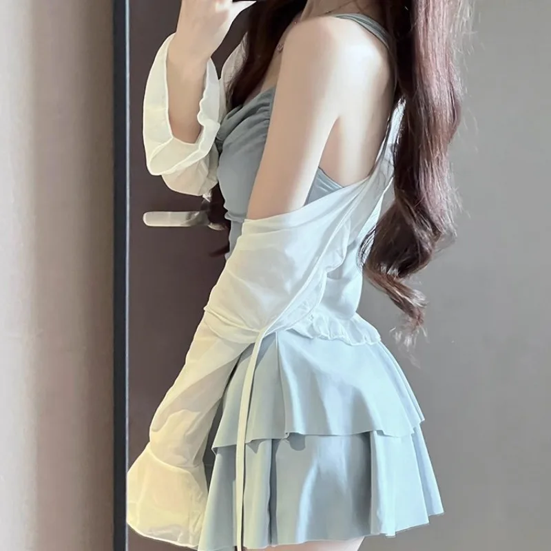 Trajes de baño para mujer, trajes de baño de una pieza con tirantes de Color sólido, traje de baño de primavera con espalda descubierta dulce a la moda, versión coreana